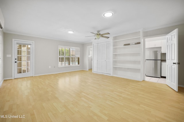 429 Linda Dr, Biloxi, MS 39531 - unfurnished living room featuring crown molding, a ceiling fan, and light wood finished floors