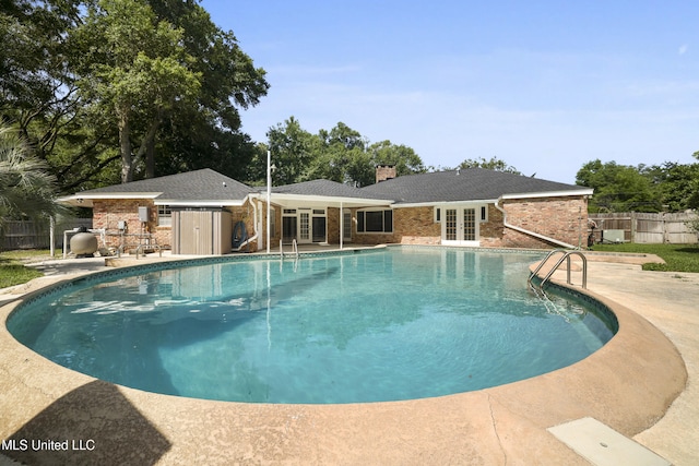 429 Linda Dr, Biloxi, MS 39531 - view of swimming pool with french doors and a patio area