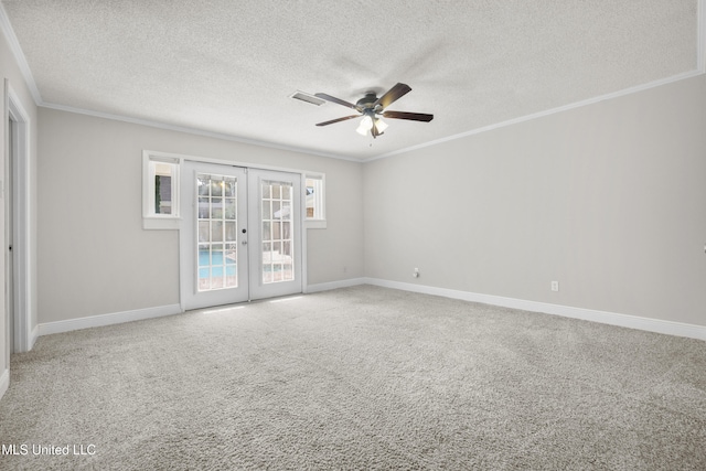 429 Linda Dr, Biloxi, MS 39531 - carpeted spare room with ceiling fan, french doors, a textured ceiling, and crown molding