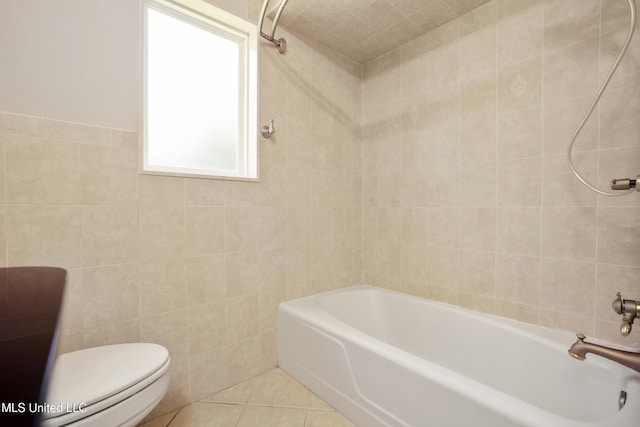429 Linda Dr, Biloxi, MS 39531 - bathroom with tile walls, tile patterned flooring, and bathtub / shower combination