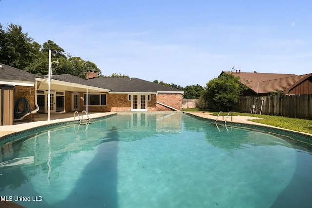 429 Linda Dr, Biloxi, MS 39531 - view of swimming pool with french doors, a fenced backyard, and a patio area