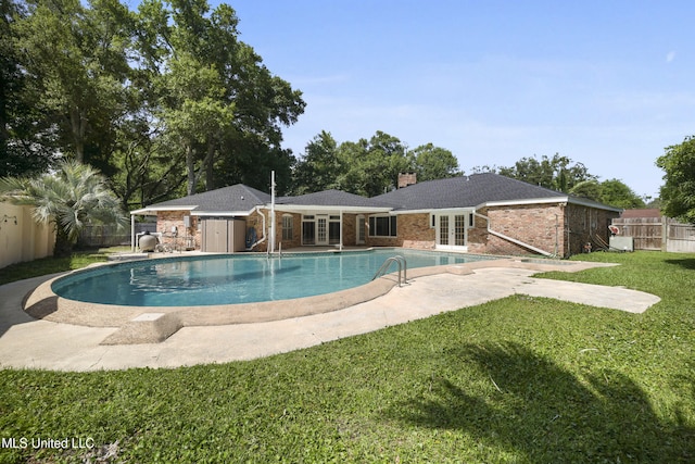 429 Linda Dr, Biloxi, MS 39531 - view of swimming pool with french doors, a fenced backyard, and a patio