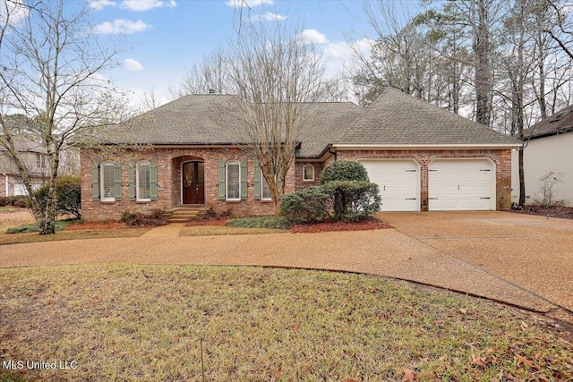 ranch-style home with a garage, brick siding, driveway, and roof with shingles