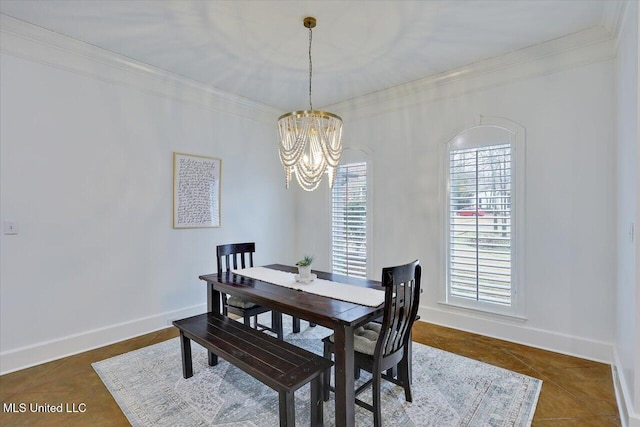 tiled dining room featuring an inviting chandelier and crown molding