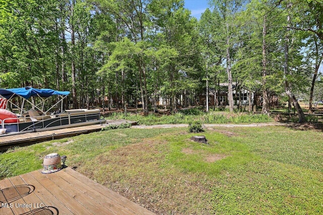 view of yard with a wooden deck