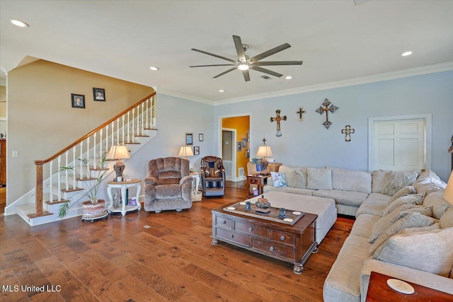 living area with wood finished floors, recessed lighting, crown molding, ceiling fan, and stairs