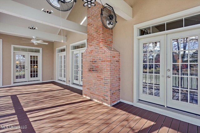 deck featuring french doors and ceiling fan