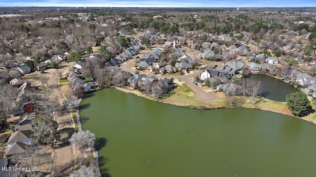 bird's eye view with a residential view and a water view