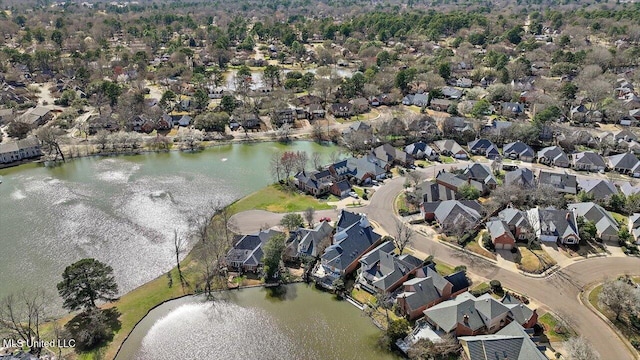 bird's eye view featuring a residential view and a water view