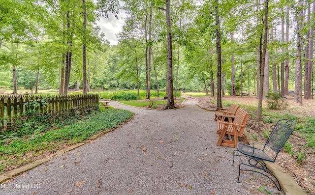 1025 Monet Cv, Brandon, MS 39047 - view of property's community featuring driveway and a view of trees
