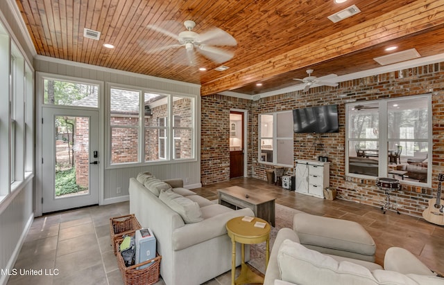1025 Monet Cv, Brandon, MS 39047 - tiled living area with a ceiling fan, wood ceiling, brick wall, and recessed lighting
