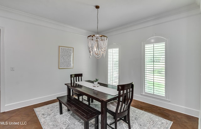 1025 Monet Cv, Brandon, MS 39047 - dining room featuring ornamental molding, plenty of natural light, a chandelier, and baseboards