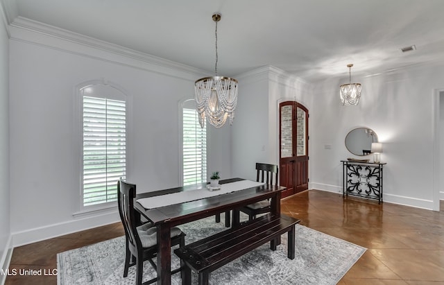 1025 Monet Cv, Brandon, MS 39047 - tiled dining space with a chandelier, crown molding, baseboards, and arched walkways