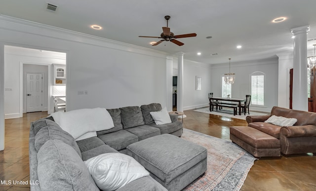 1025 Monet Cv, Brandon, MS 39047 - tiled living room with crown molding, ornate columns, ceiling fan, recessed lighting, and a chandelier