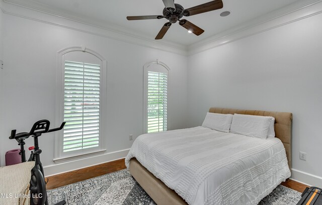 1025 Monet Cv, Brandon, MS 39047 - tiled bedroom with multiple windows, baseboards, ornamental molding, and ceiling fan
