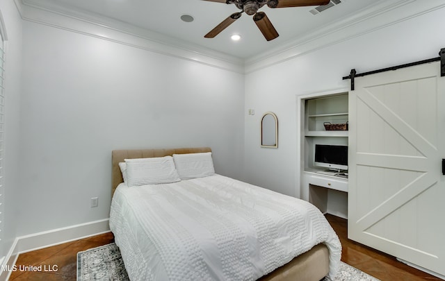 1025 Monet Cv, Brandon, MS 39047 - bedroom featuring ornamental molding, a barn door, baseboards, and ceiling fan