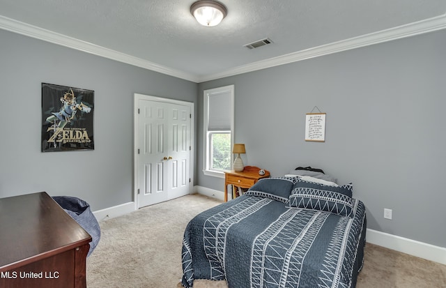 1025 Monet Cv, Brandon, MS 39047 - carpeted bedroom featuring crown molding, baseboards, a textured ceiling, and a closet