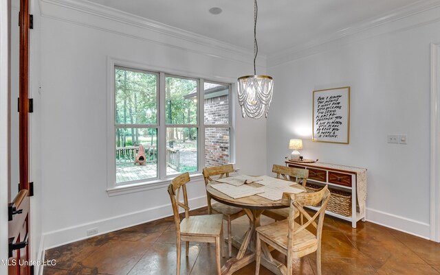 1025 Monet Cv, Brandon, MS 39047 - dining space with a chandelier, ornamental molding, and baseboards