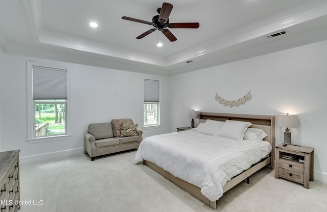 1025 Monet Cv, Brandon, MS 39047 - bedroom with a tray ceiling, multiple windows, light carpet, ornamental molding, and recessed lighting