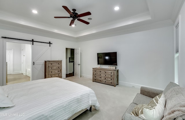 1025 Monet Cv, Brandon, MS 39047 - bedroom featuring a raised ceiling, ornamental molding, a barn door, recessed lighting, and baseboards