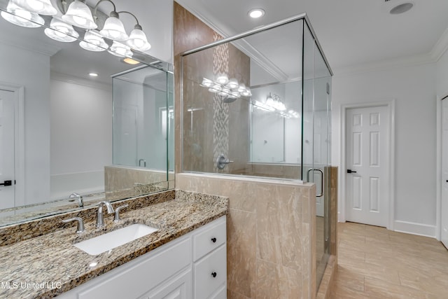 1025 Monet Cv, Brandon, MS 39047 - full bathroom with crown molding, vanity, a shower stall, a chandelier, and recessed lighting