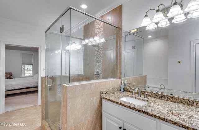 1025 Monet Cv, Brandon, MS 39047 - ensuite bathroom with a stall shower, vanity, ornamental molding, a chandelier, and recessed lighting