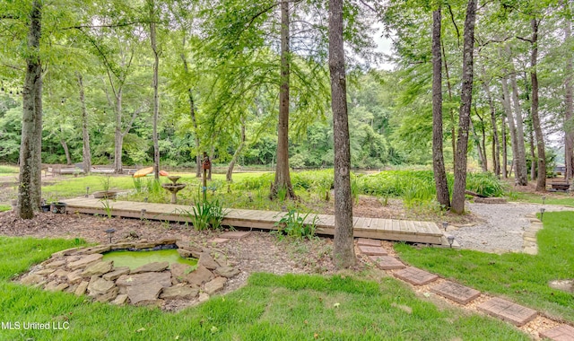 1025 Monet Cv, Brandon, MS 39047 - view of yard with a wooden deck