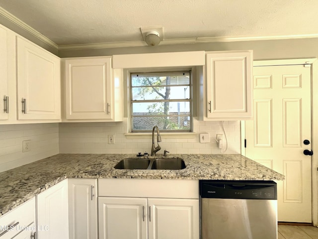 kitchen featuring dishwasher, crown molding, a sink, white cabinets, and a textured ceiling
