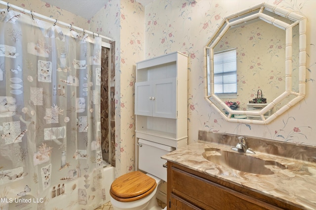 full bathroom featuring vanity, shower / bath combo, and toilet