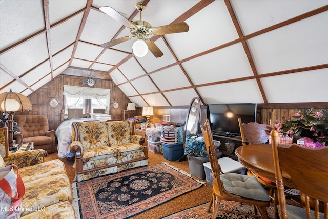 interior space with ceiling fan, carpet flooring, vaulted ceiling, and wooden walls