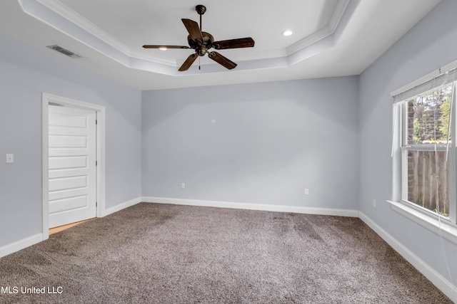709 Champagne Dr, Biloxi, MS 39532 - unfurnished room featuring a tray ceiling, carpet flooring, crown molding, ceiling fan, and recessed lighting