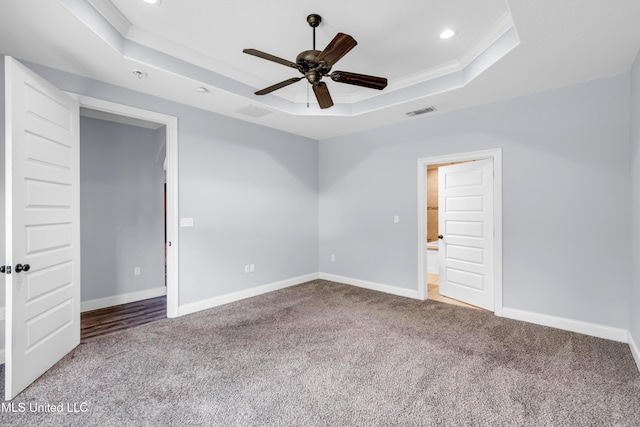 709 Champagne Dr, Biloxi, MS 39532 - unfurnished bedroom featuring a raised ceiling, carpet, recessed lighting, ornamental molding, and ceiling fan