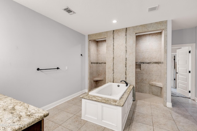 709 Champagne Dr, Biloxi, MS 39532 - full bath with a garden tub, tile patterned flooring, vanity, recessed lighting, and tiled shower