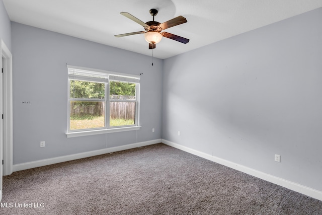709 Champagne Dr, Biloxi, MS 39532 - carpeted empty room featuring ceiling fan and baseboards