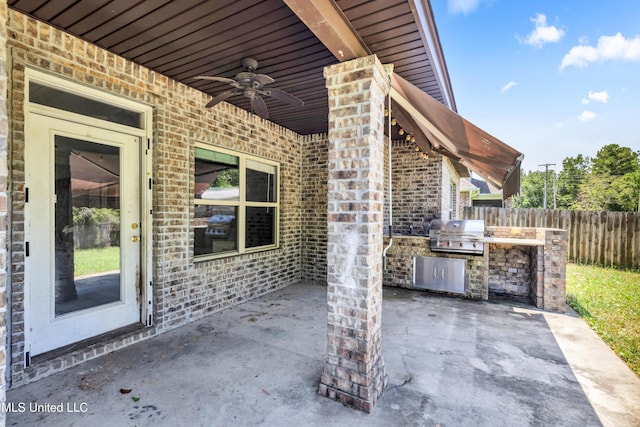 709 Champagne Dr, Biloxi, MS 39532 - view of patio / terrace with an outdoor kitchen and a ceiling fan
