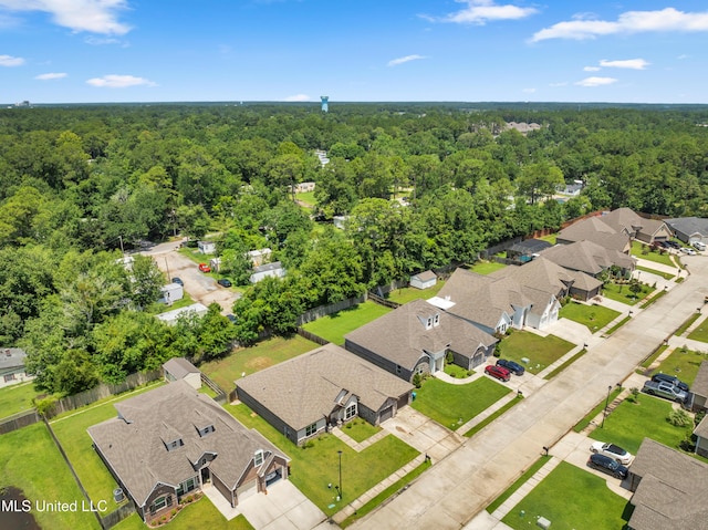 709 Champagne Dr, Biloxi, MS 39532 - aerial view of residential area with a heavily wooded area