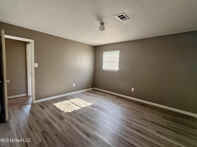 108 Mount Bass, Long Beach, MS 39560 - unfurnished room with wood finished floors and baseboards