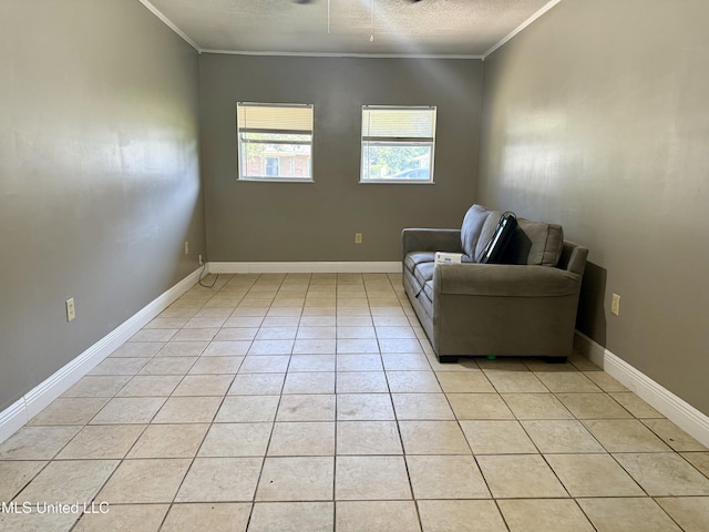 108 Mount Bass, Long Beach, MS 39560 - living area featuring ornamental molding, light tile patterned floors, a textured ceiling, and baseboards