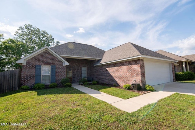 ranch-style house featuring a front yard, a garage, brick siding, fence, and concrete driveway