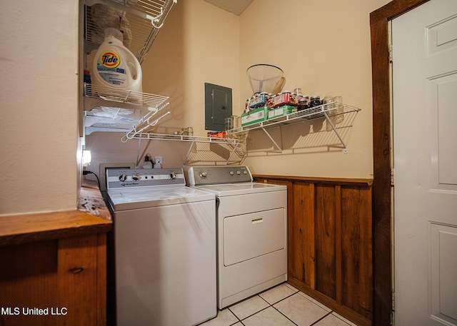 103 Hidden Lake Rd, Flora, MS 39071 - washroom featuring washing machine and clothes dryer, electric panel, light tile patterned floors, and wainscoting