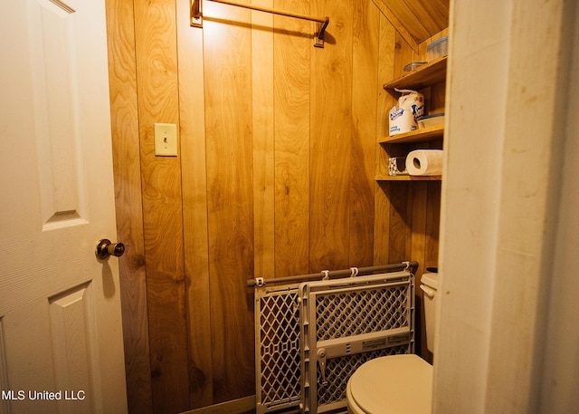 103 Hidden Lake Rd, Flora, MS 39071 - bathroom with wooden walls and toilet