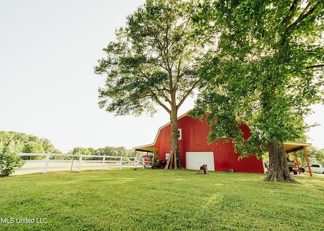 103 Hidden Lake Rd, Flora, MS 39071 - view of yard with an outbuilding, an outdoor structure, and a detached garage