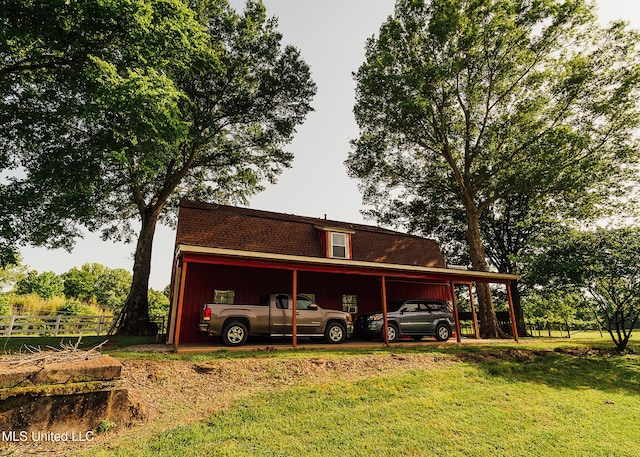 103 Hidden Lake Rd, Flora, MS 39071 - rear view of house with an attached carport