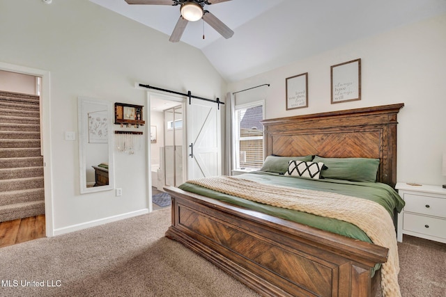6177 W Sandbourne, Olive Branch, MS 38654 - carpeted bedroom with lofted ceiling, baseboards, a barn door, connected bathroom, and a ceiling fan