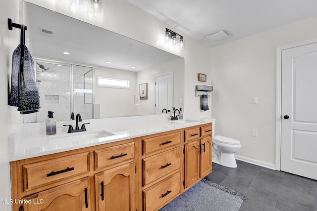 6177 W Sandbourne, Olive Branch, MS 38654 - full bath featuring visible vents, double vanity, toilet, a shower stall, and a sink