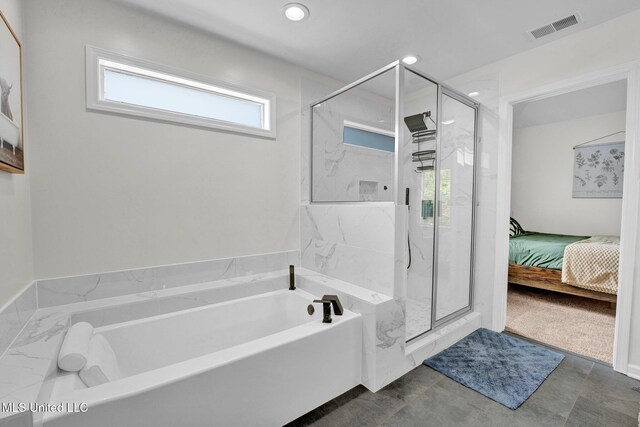 6177 W Sandbourne, Olive Branch, MS 38654 - full bath with a marble finish shower, ensuite bathroom, a garden tub, and visible vents