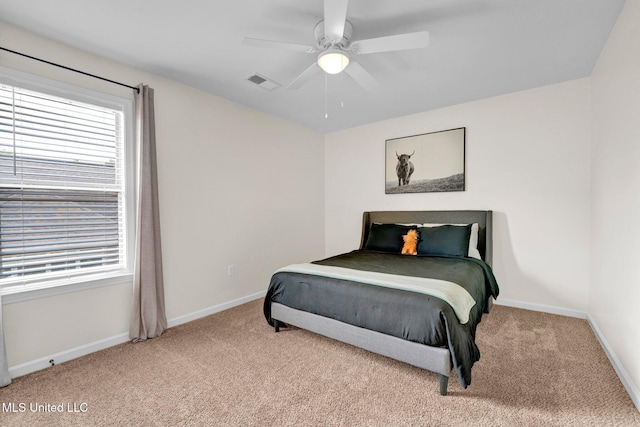 6177 W Sandbourne, Olive Branch, MS 38654 - bedroom with multiple windows, light carpet, and visible vents