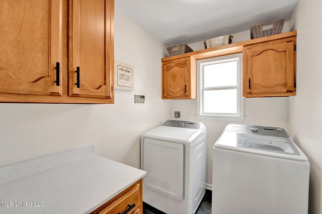 6177 W Sandbourne, Olive Branch, MS 38654 - laundry room with separate washer and dryer and cabinet space