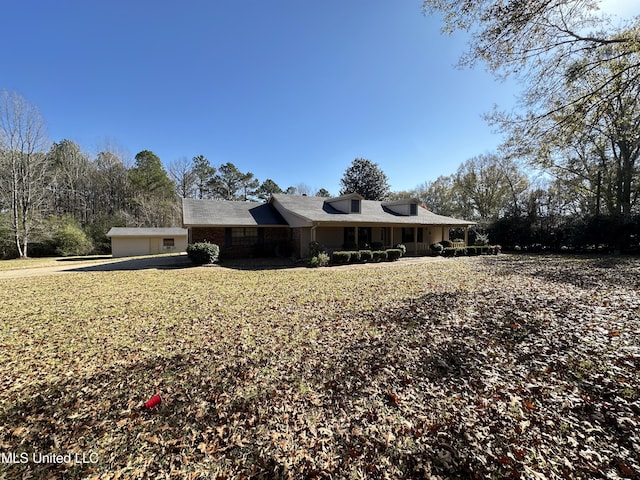 ranch-style house featuring a garage