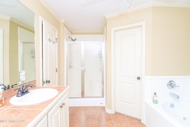 404 Briars Bnd, Brandon, MS 39042 - bathroom featuring a shower stall, vanity, tile patterned floors, a garden tub, and crown molding